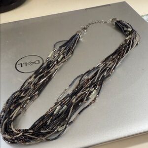 Beautiful waterfall beaded necklace 18”20”. Black copper silver beads.